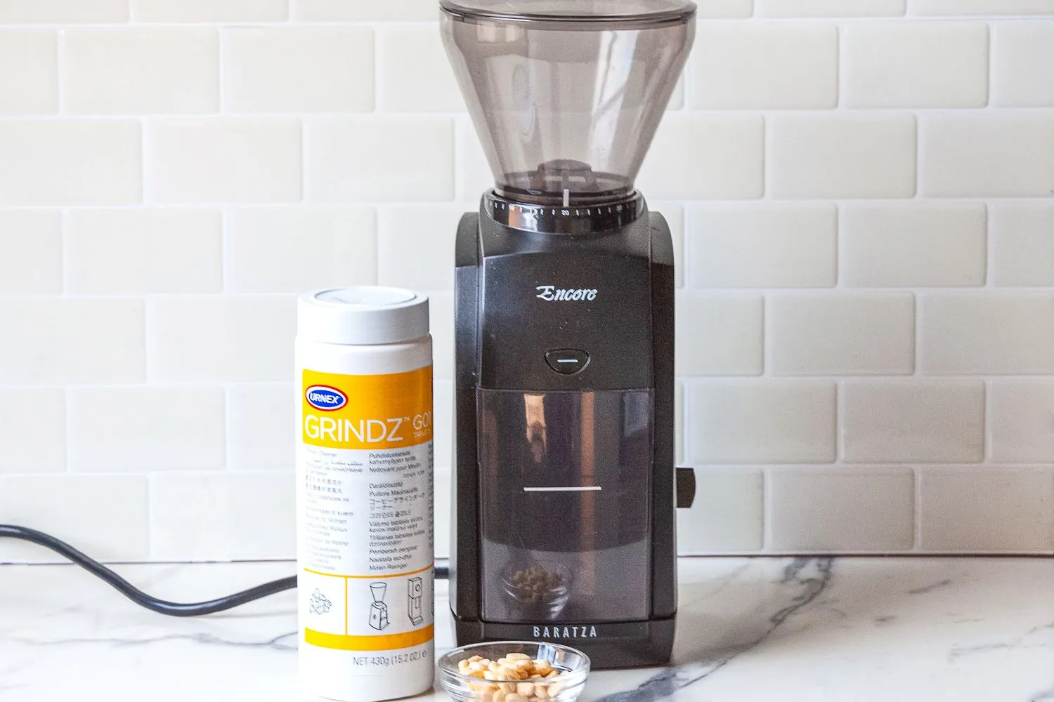 How to Clean Coffee Grinder Burrs: A Step-by-Step Guide Oily dark roast coffee beans contrasted with light roast coffee beans.